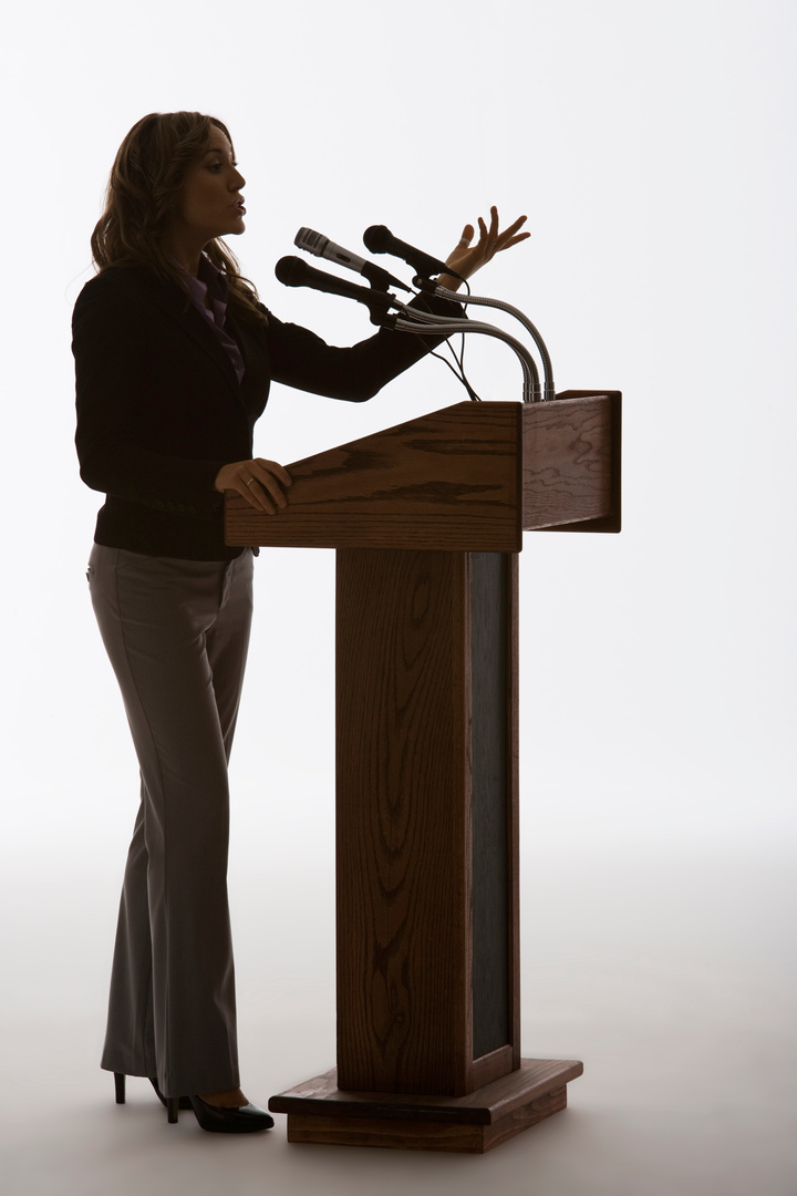 Woman speaking from podium